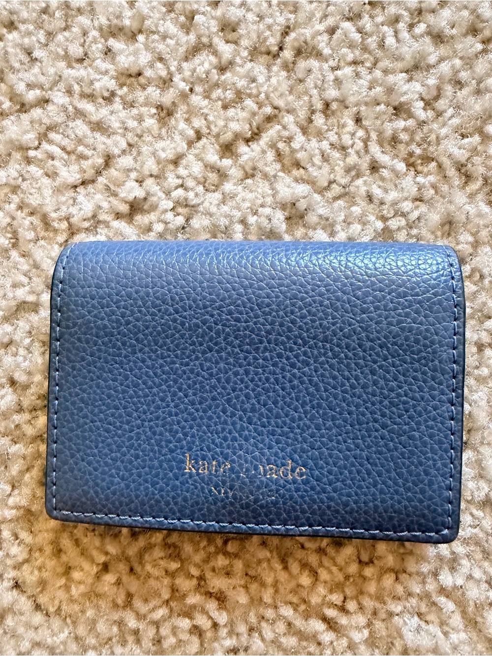 kate spade navy pebbled leather card case with gold logo